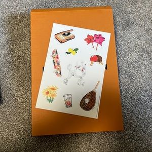 Louis Vuitton stickers and box.